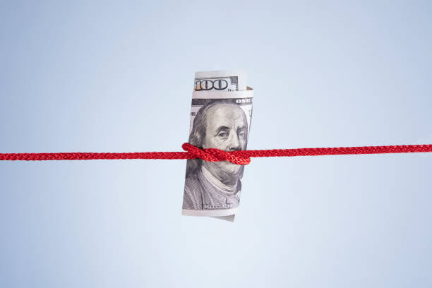 istock One Hundred Dollar Banknote Tied Up 1443522039