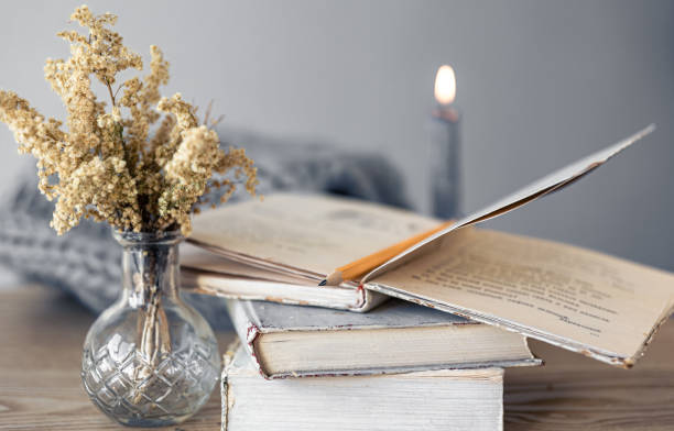 istock Cozy home composition with books on the table close-up. 1443522183