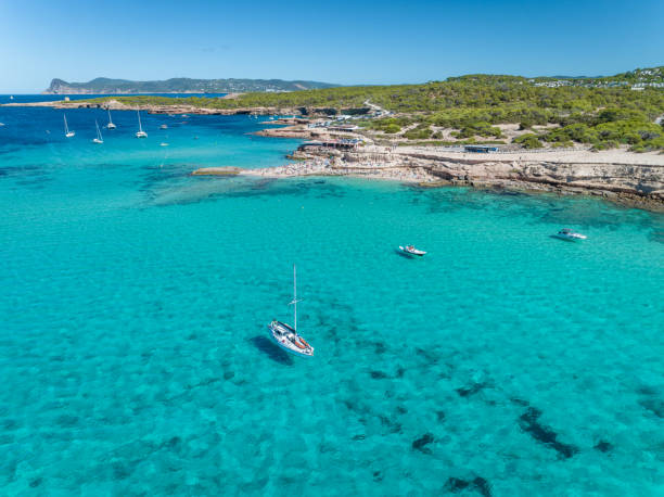 istock Expensive Motor Yacht Moored in a Peaceful Turquoise Bay 1443523151
