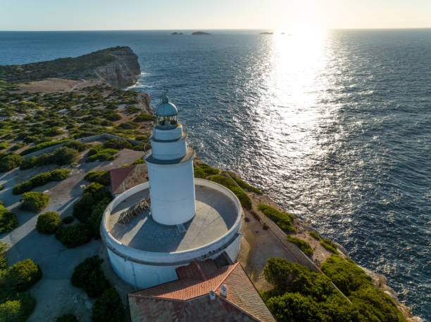 istock Lighthouse on a Tall Cliff Overlooking the Mediterranean Sea 1443524209