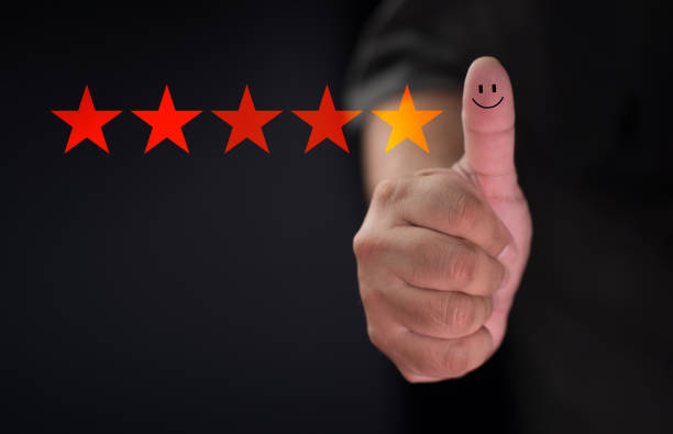 istock Customer satisfaction concept. Hand with thumb up Positive emotion smiley face icon and five star 1443526120
