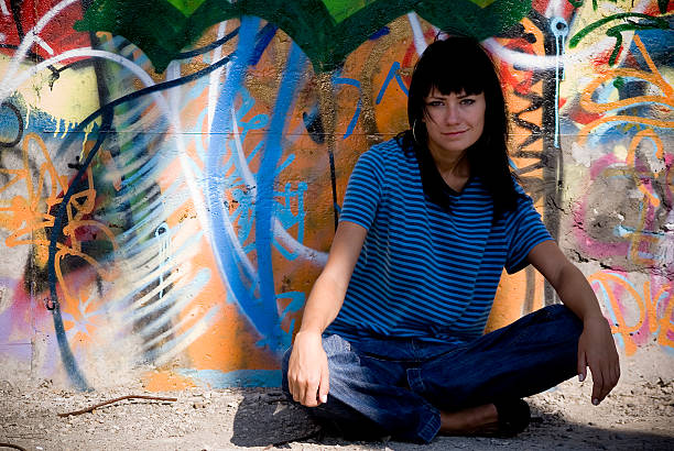 istock Beautiful girl around the wall 144352845