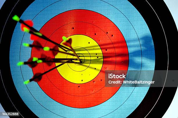 Arrows Hitting Bullseye Of Archery Target Stock Photo - Download Image Now - Archery, Sports Target, Accuracy