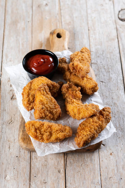 istock Crispy Kentucky fried chicken on wooden table 1443529974