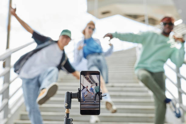 close up of hip hop dance crew filming video for social media - hip hop urban scene city life black imagens e fotografias de stock