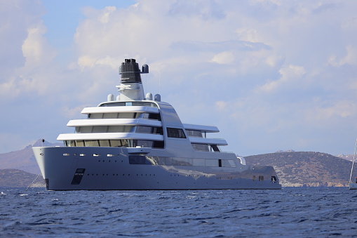 Bodrum, Turkey-  November 06, 2022: The giant superyacht Solaris, owned by Russian businessman Roman Abramovich, anchored in Bodrum's