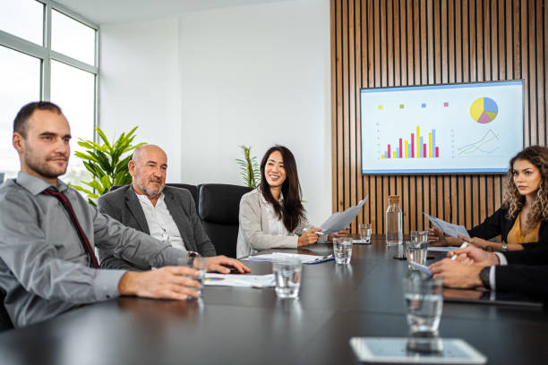 istock Business Meeting with Statistics Presentation 1443531631