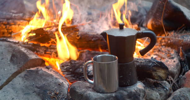 istock Coffee is prepared in a geyser coffee maker on a campfire 1443533406