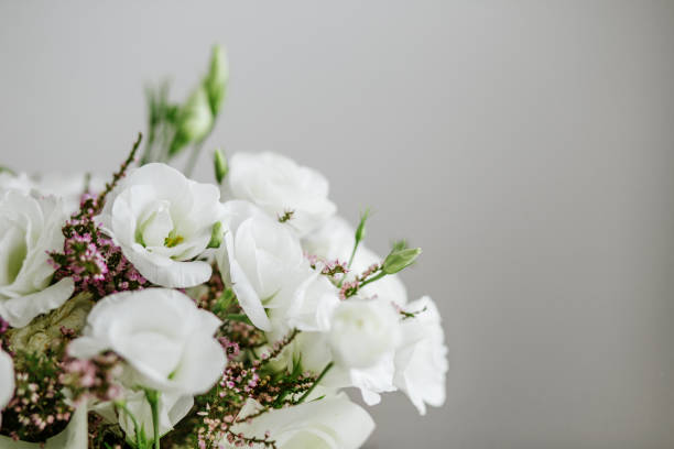 istock Beautiful bouquet with lisianthus and heather. Place for text. Concept for background, gift, holiday 1443534370