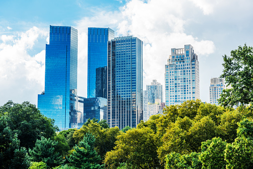 New York, USA - September 26, 2018: Central Park view with skyscrapers in Manhattan. Popular destination for tourists. New York City, USA.