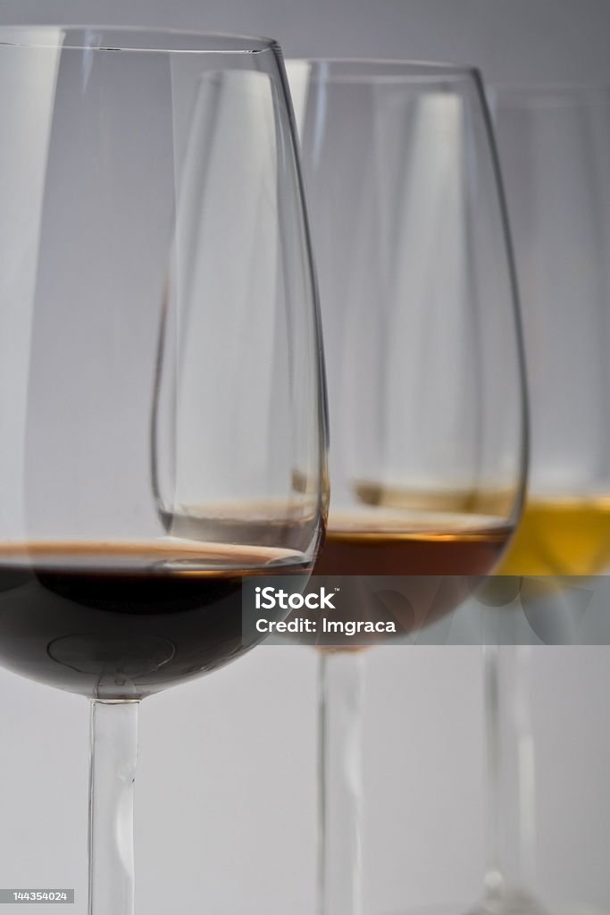 Three colours Three wineglasses with three different kinds of wine. Drinking Glass Stock Photo