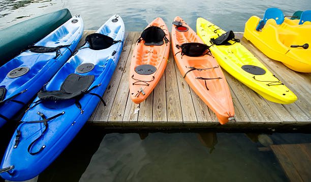 istock Kayaks and canoes on the dock 144354098