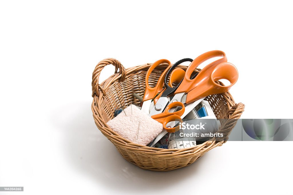 Basket with scissors Basket with scissors on white background Adult Stock Photo