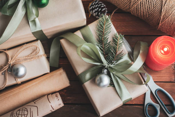 istock Flat lay composition with Christmas gift boxes and decor on wooden table 1443544578