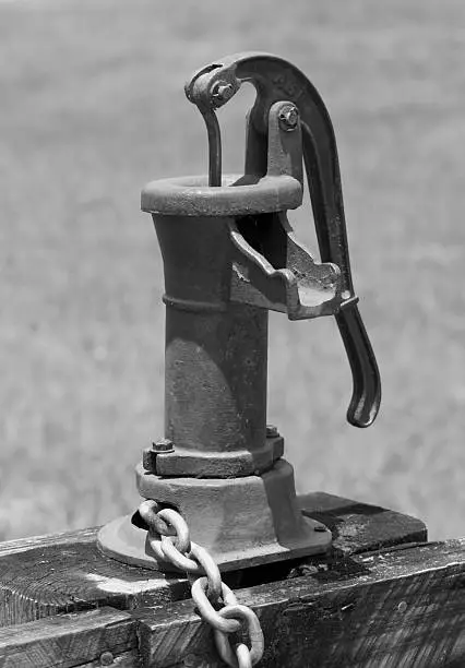 Old water pump for well. Black and white version