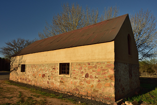 An old brick farmyard barn on a sheep farm in Ceres district Western Cape