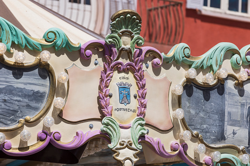 coat of arms of Porto Vecchio on the top of a carousel