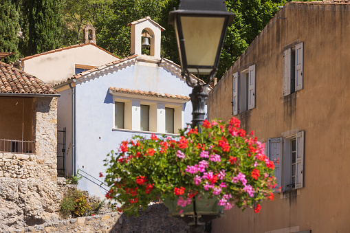 houses at Moustiers-Sainte-Marie, or Moustiers, in the Provence region. It considered as one of the most beautiful villages of France; Moustiers, France