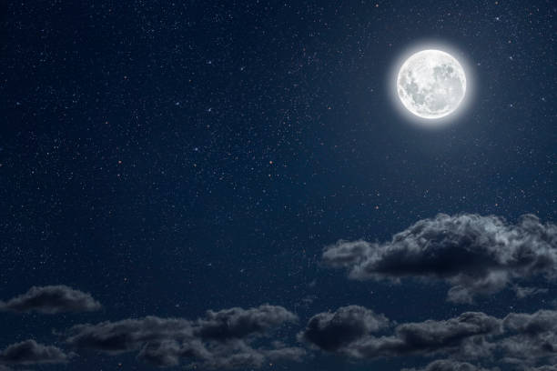 istock Backgrounds night sky with stars moon and clouds for Christmas 1443549897