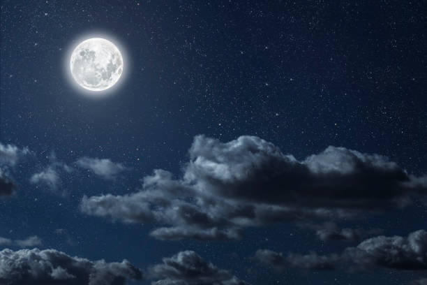 istock Backgrounds night sky with stars moon and clouds for Christmas 1443549926
