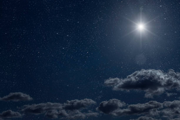 istock Backgrounds night sky with stars moon and clouds for Christmas 1443549951