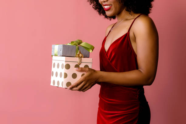 istock An Unrecognizable Woman Holding Beautifully Wrapped New Year Pre 1443550104