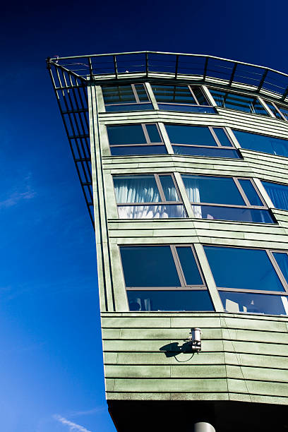 istock Green building against the blue sky 144355036