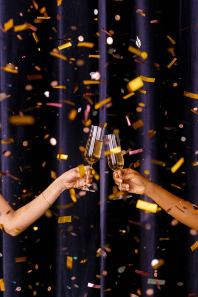 istock It's Time To Celebrate: Two Unrecognizable Women Holding Glasses 1443551258