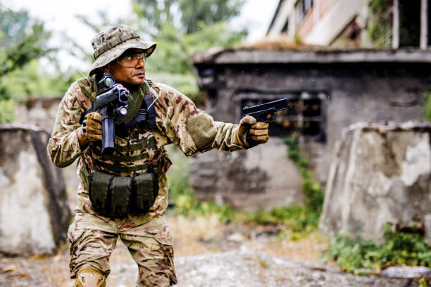 istock African army soldier searching battlefield 1443551402