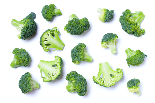 Fresh raw Broccoli isolated on white background, top view, flat lay.
