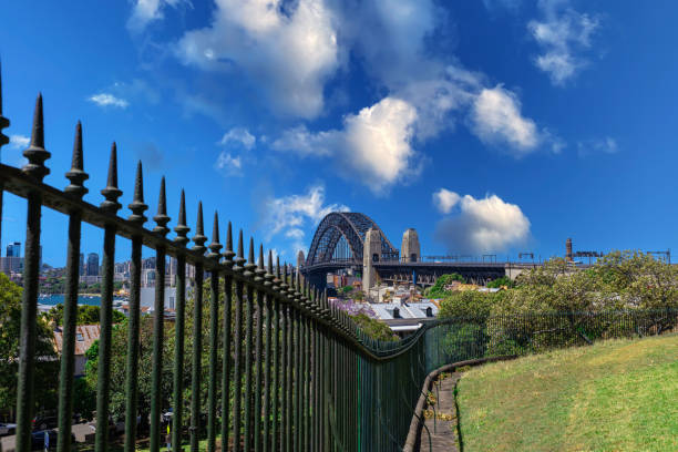 Sydney Harbour viewed from Observatory Park and overlooking Sydney Rocks area and North Sydney with colourful skies NSW Australia