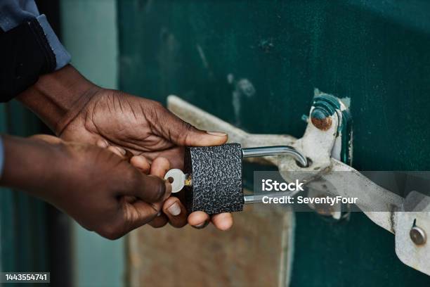 Close Up Of Male Hands Opening Lock Stock Photo - Download Image Now - Locking, Padlock, Lock