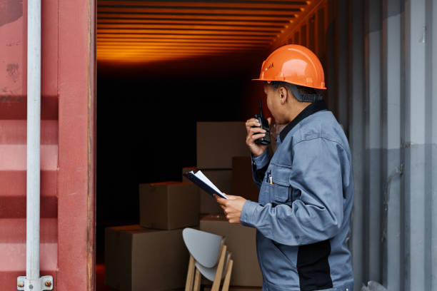 istock Female worker at shipping dock 1443555716
