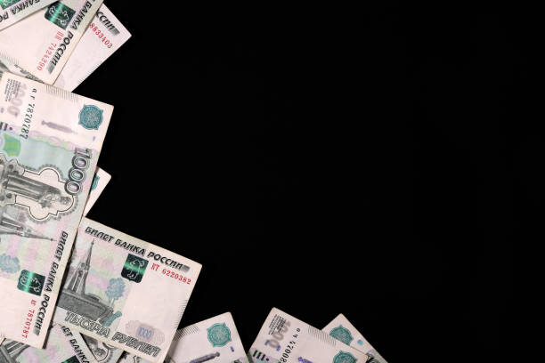 istock Frame of Russian rubles banknotes on black background. copy space for text 1443556065