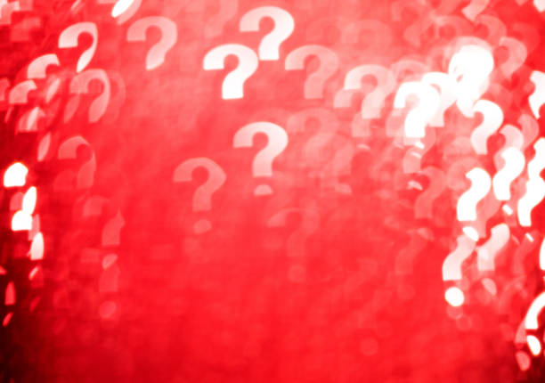 Defocused background with question marks stock photo