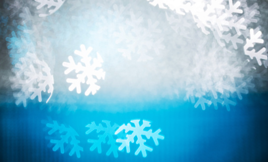 Defocused background with snowflake shape.