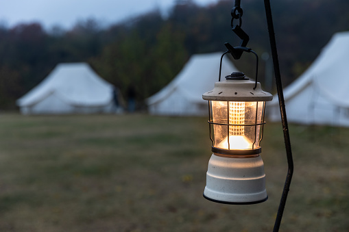 morning electric lamp hanging in camping tent light up