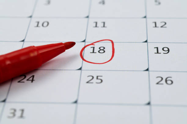 istock Red mark on the calendar at number 18 1443561980