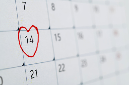 February calendar marked with heart shape.