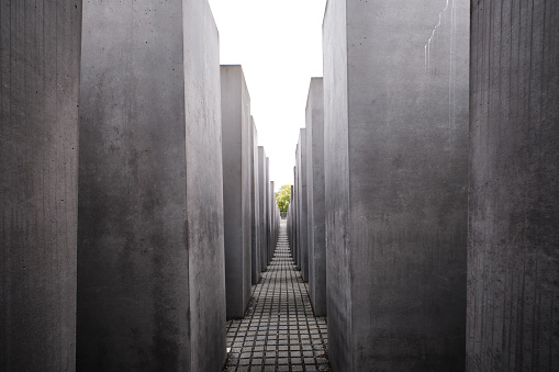 Berlin, Germany - Sept 2022: Concrete blocks of the Holocaust Memorial near Brandenburg Gate in Berlin Mitte