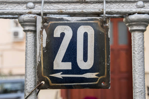 istock Weathered enameled plate number 20 1443569379