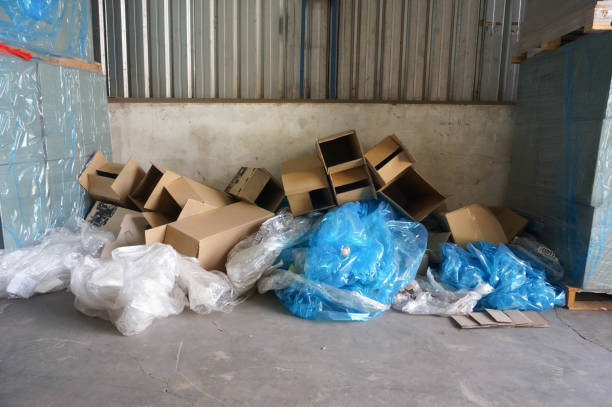 Waste cardboard and plastic in a warehouse. Waste cardboard and plastic in a warehouse. karman stock pictures, royalty-free photos & images