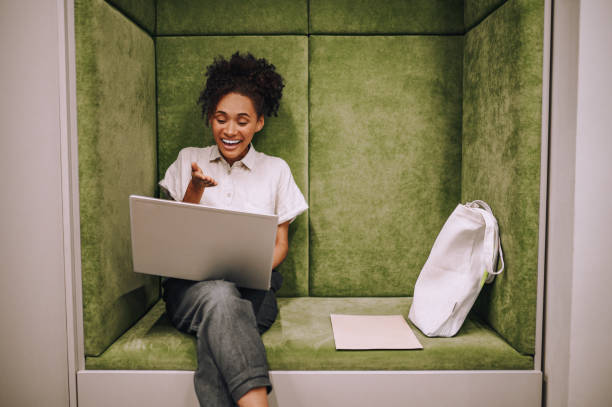 istock Young pretty woman smiling during the video call 1443570822