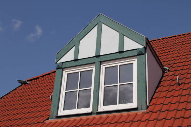 a house with a dormer window a house with a dormer window dormer stock pictures, royalty-free photos & images