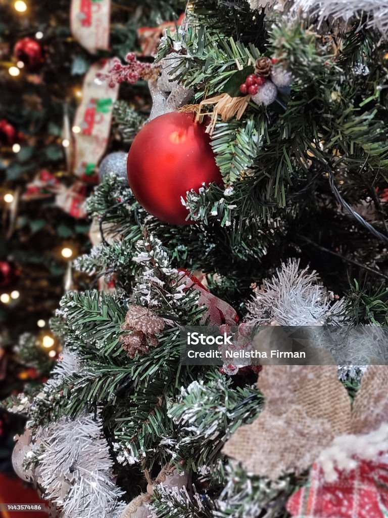 Close up of Christmas decorations on Christmas tree Close up of Christmas decorations on Christmas tree. Full frame defocused Beauty Stock Photo