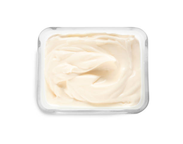 istock Mayonnaise in glass bowl isolated on white, top view 1443576694