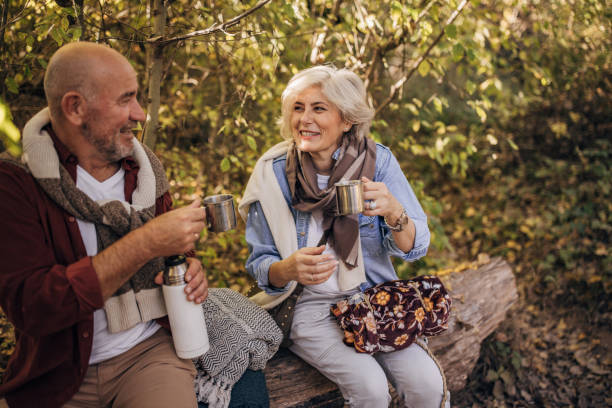 istock Married couple relaxing in nature 1443577477