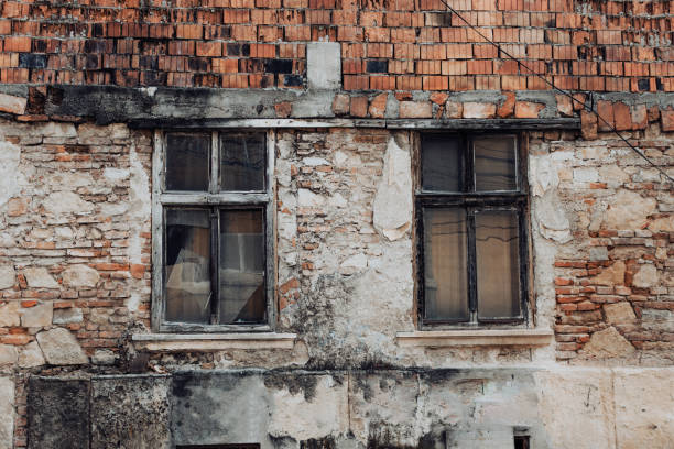 istock Damaged textured exterior of a home 1443581387