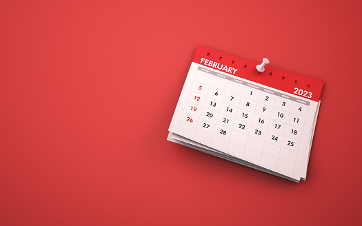 3d render February 2023 Calendar on Red Background, White Pushpin, Can be used for reminder day, special day concept (Close-Up)