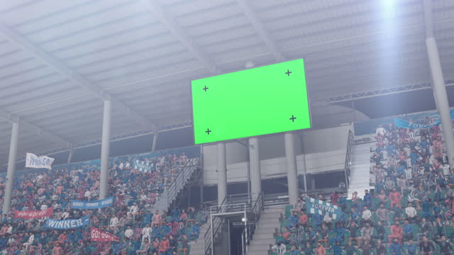Football Soccer Stadium Championship Match, Zoom In on Scoreboard Green Chroma Key Screen. Crowd of Fans Cheering, Having Fun. Sport Channel Television Advertising Playback. Mock-up Display Concept